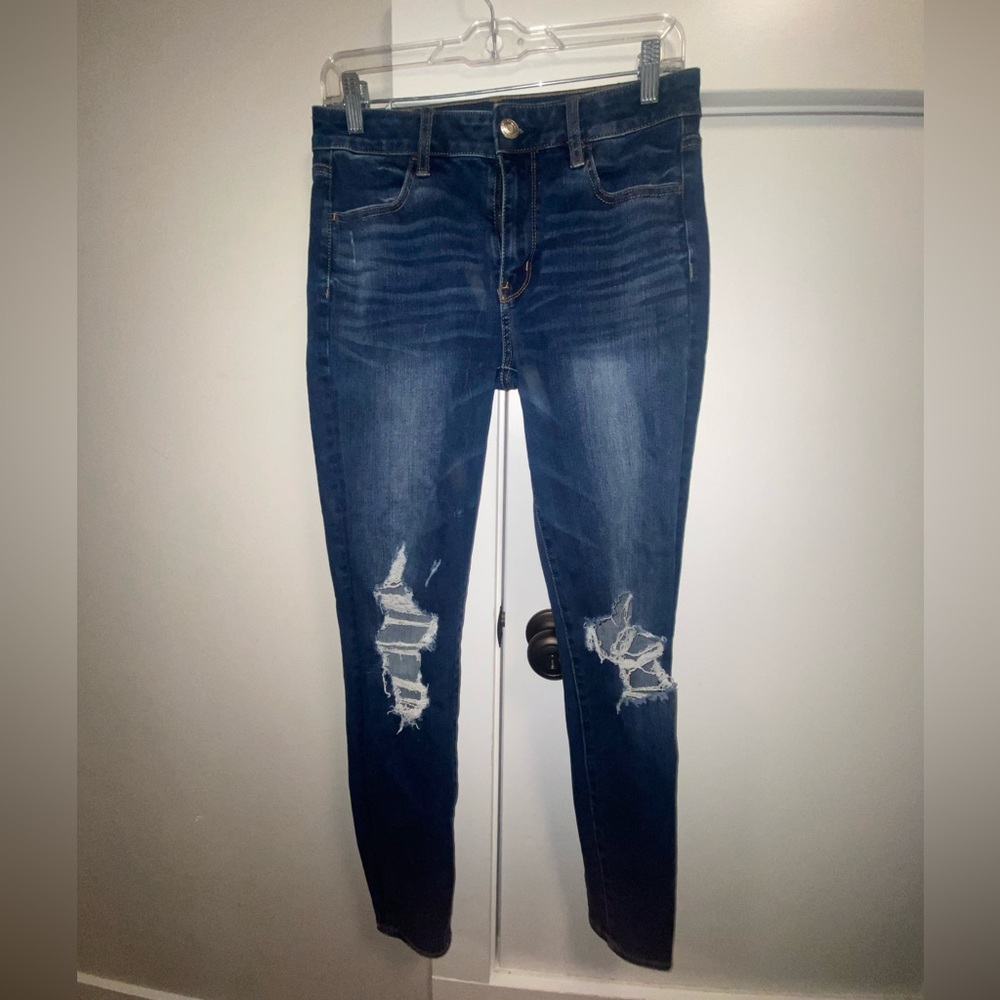 American Eagle (Next Level Stretch) blue distressed skinny jean.